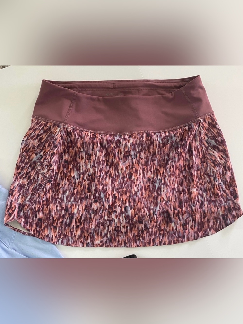 ATHLETA “Run with it “ 14 inch SKORT abstract print NEW W/0 Tags.